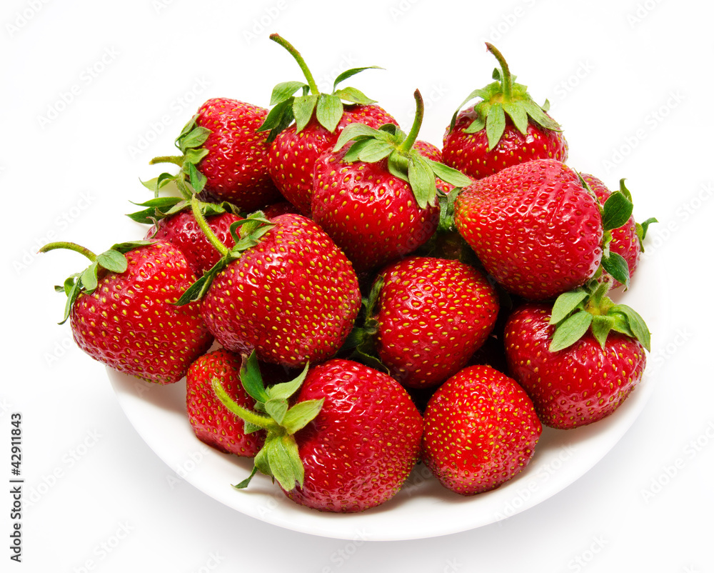 Red strawberry in the bowl closeup Red strawberry in the bowl closeup