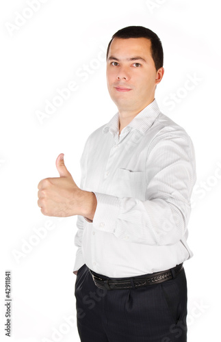 Portrait ofyoung businessman with thumb up photo