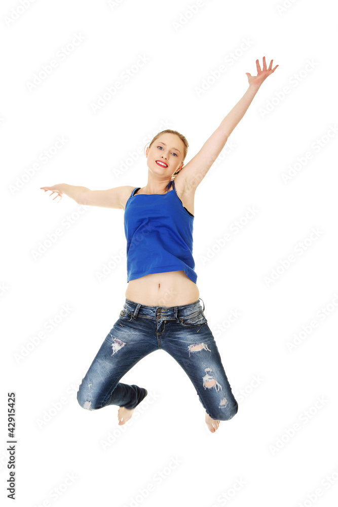 Obraz premium Jumping happy teen girl