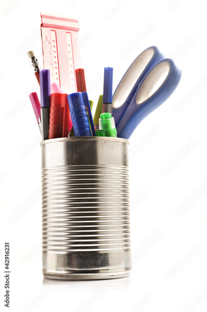 Fototapeta premium Stationery in a tin can on white