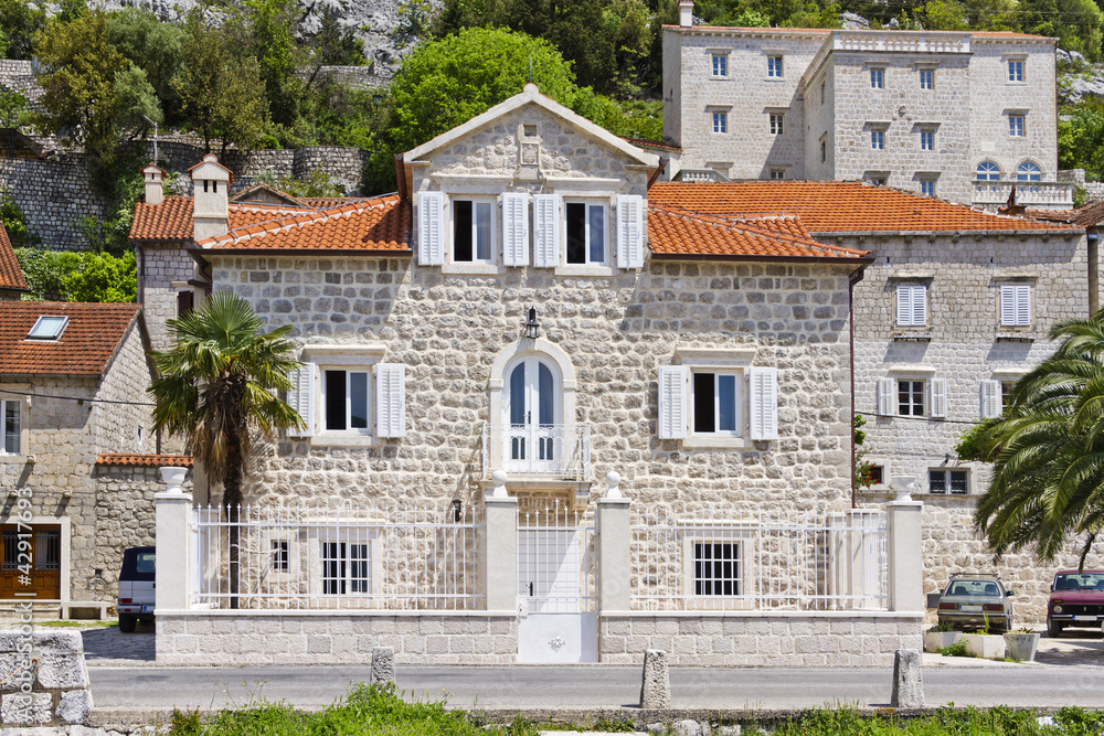 Mediterranean stone houses in Perast on shore of Boka Kotor bay Mediterranean stone houses in Perast on shore of Boka Kotor bay