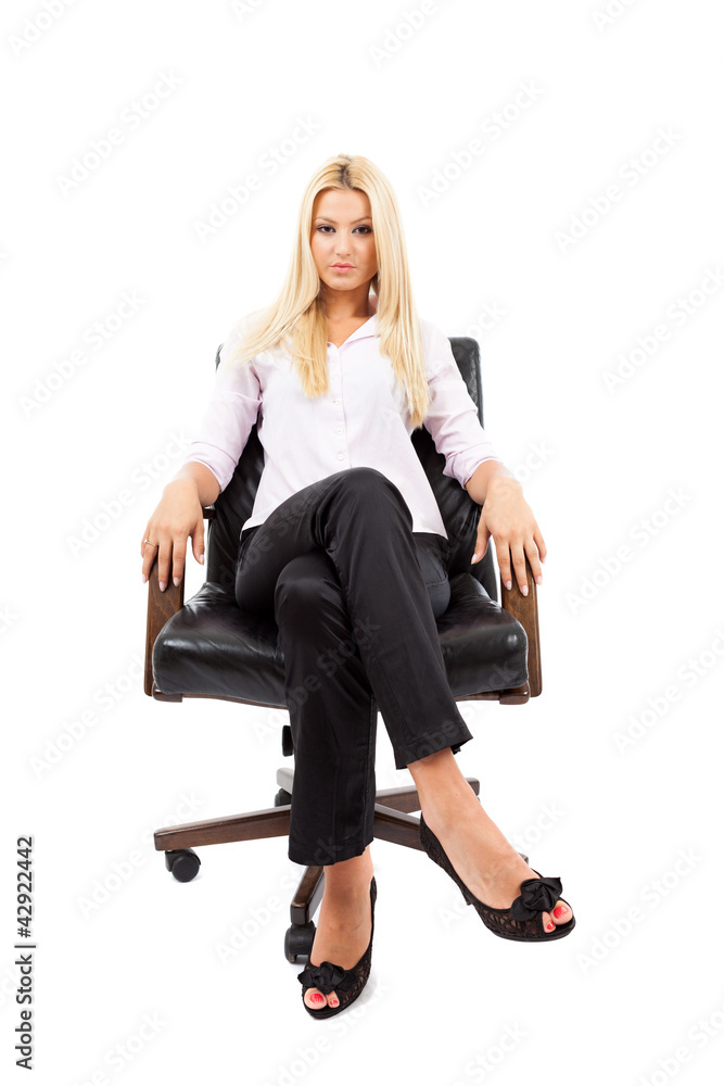 Businesswoman sitting in a chair Businesswoman sitting in a chair