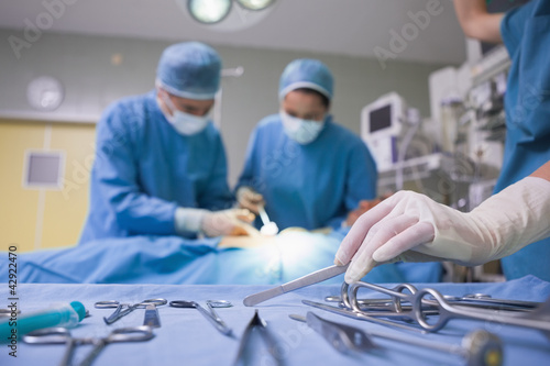 Focus shot of a surgical tray in an operating theater photo