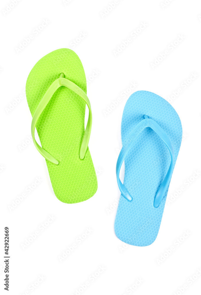 Mismatched Colorful Flip Flops Isolated on White Mismatched Colorful Flip Flops Isolated on White
