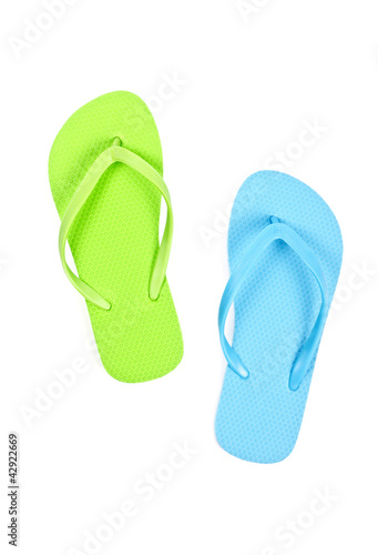 Mismatched Colorful Flip Flops Isolated on White