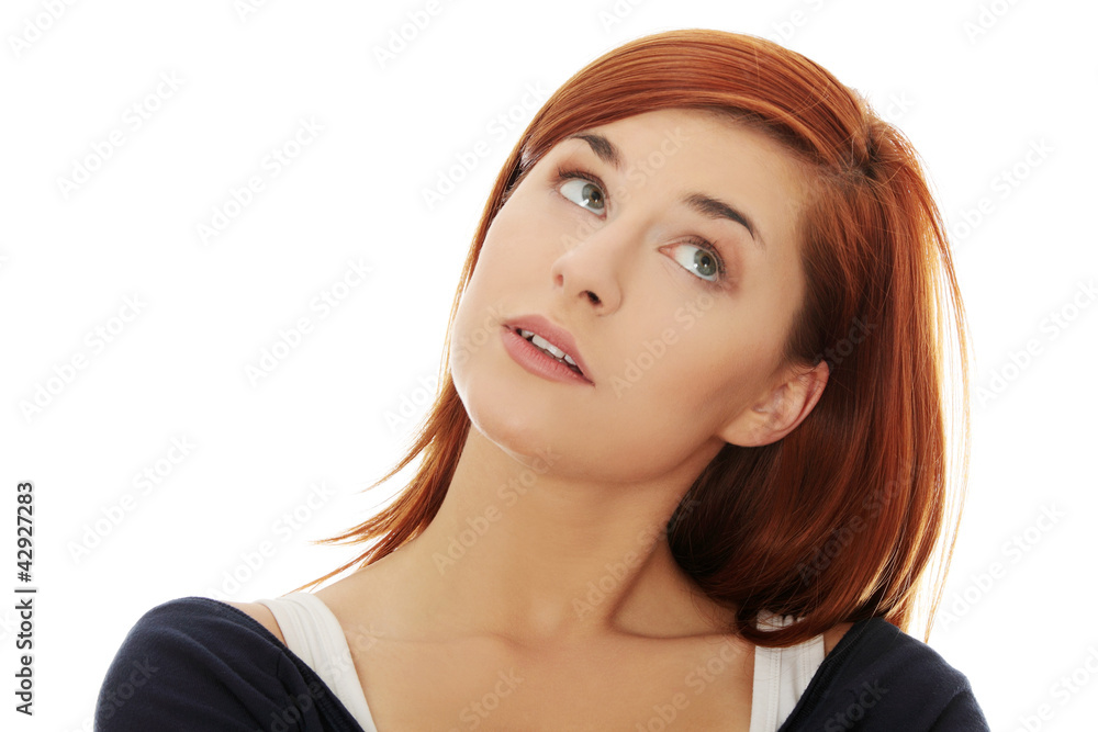 Young beautiful woman is wondering and thinking Young beautiful woman is wondering and thinking