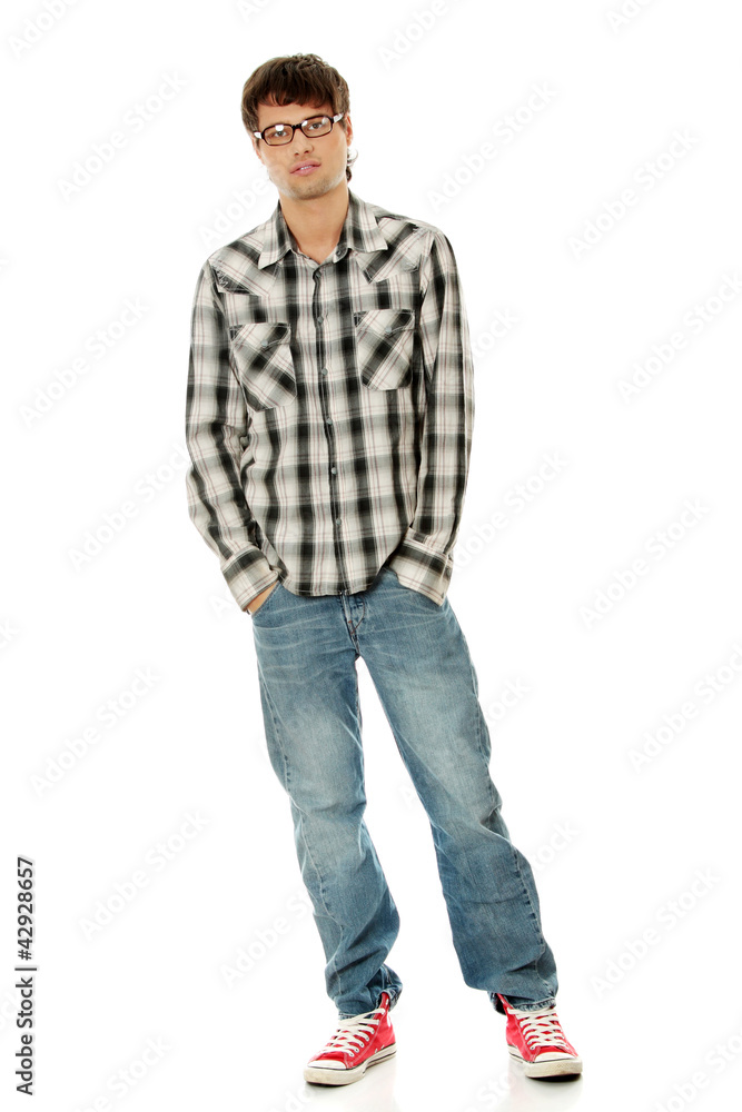 Young man with hands in pockets Young man with hands in pockets