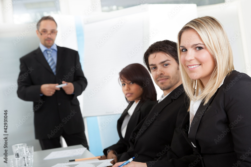 Group of business people at presentation Group of business people at presentation