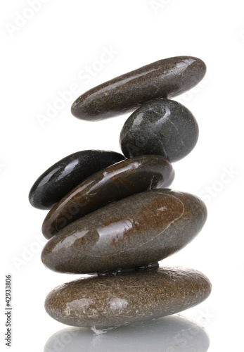 Stack of balanced stones isolated on white photo