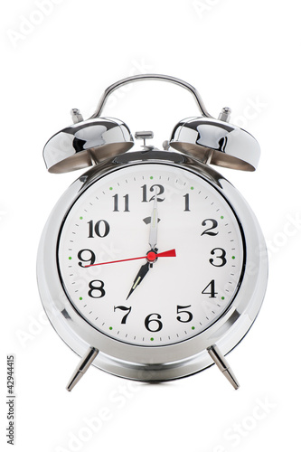 classical alarm clock on white background