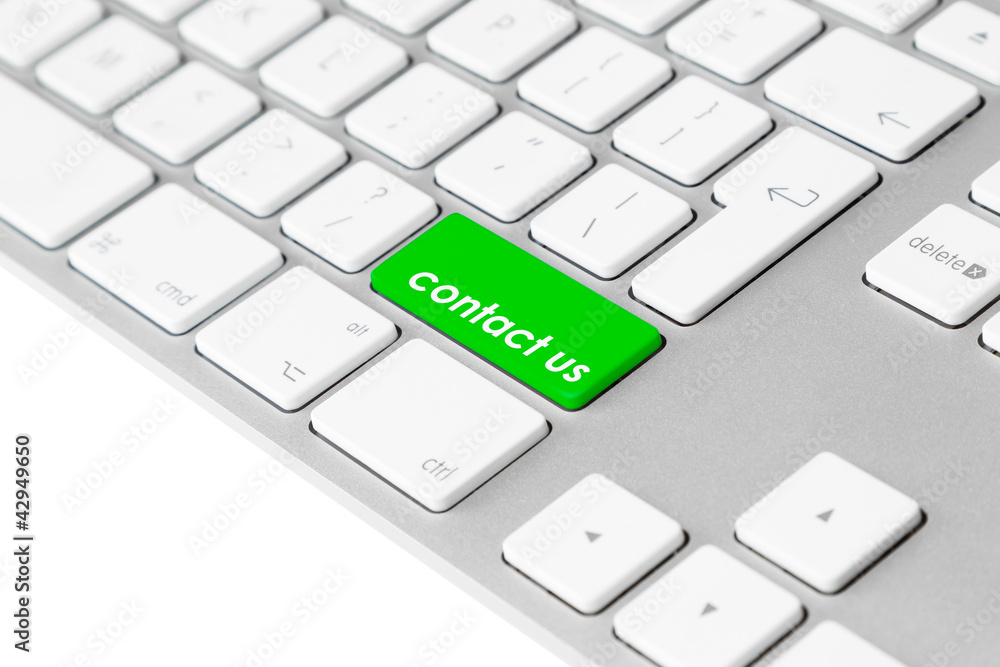 Computer keyboard with green “contact us” button Computer keyboard with green “contact us” button