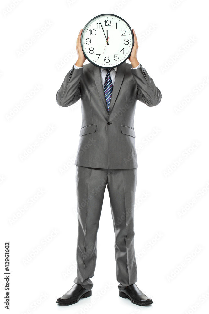 man covering his face with clock man covering his face with clock