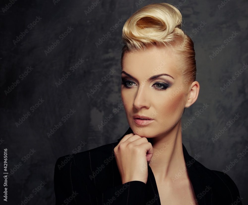 Fashionable woman with creative hairstyle Fashionable woman with creative hairstyle