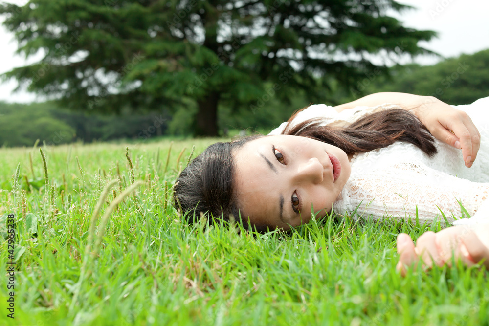 Beautiful young woman on the green Beautiful young woman on the green
