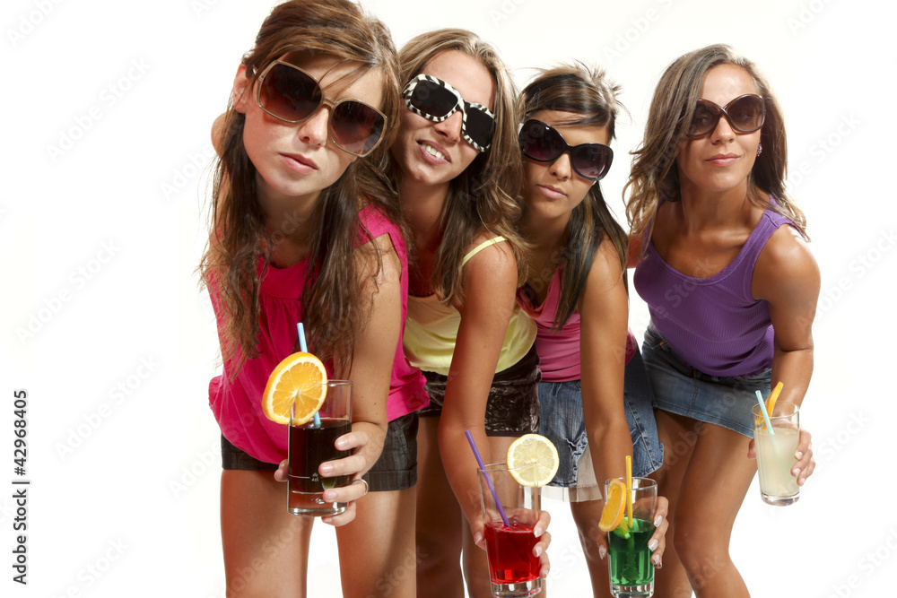 Obraz premium four girls have fun at the party, studio portrait