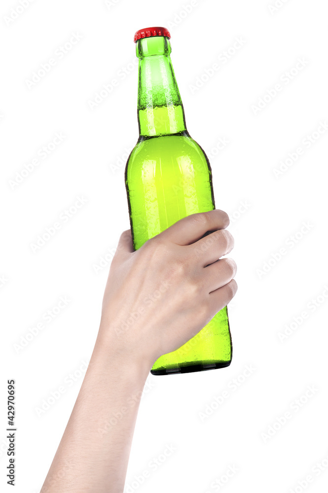 hand holding Bottle of beer with drops isolated hand holding Bottle of beer with drops isolated