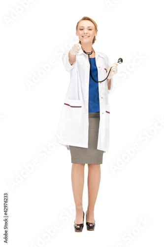 attractive female doctor pointing her finger