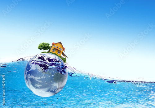 Earth falls deeply under water with a splash.Elements of this im