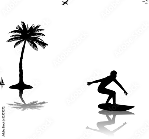 Beautiful young man surfing near the palms silhouette