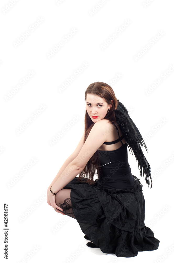Beautiful brunette woman with black wings Beautiful brunette woman with black wings