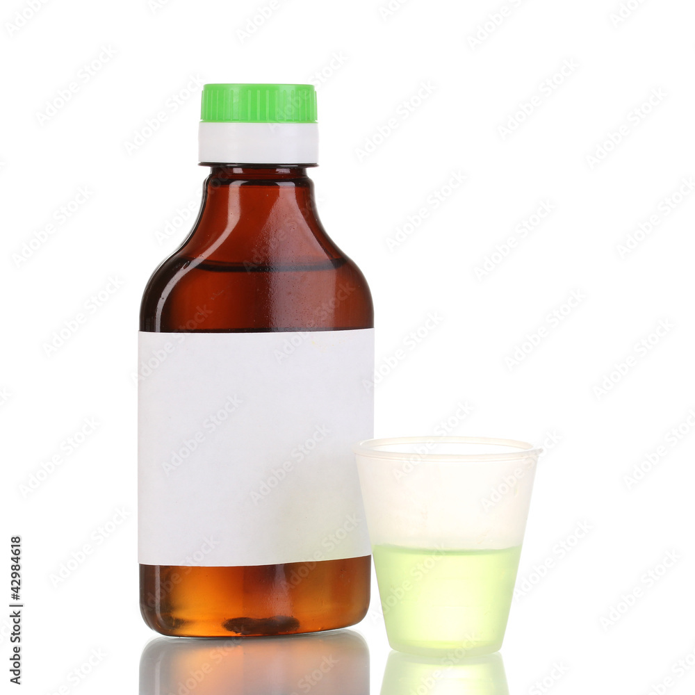 Medical bottle and jigger isolated on white Medical bottle and jigger isolated on white