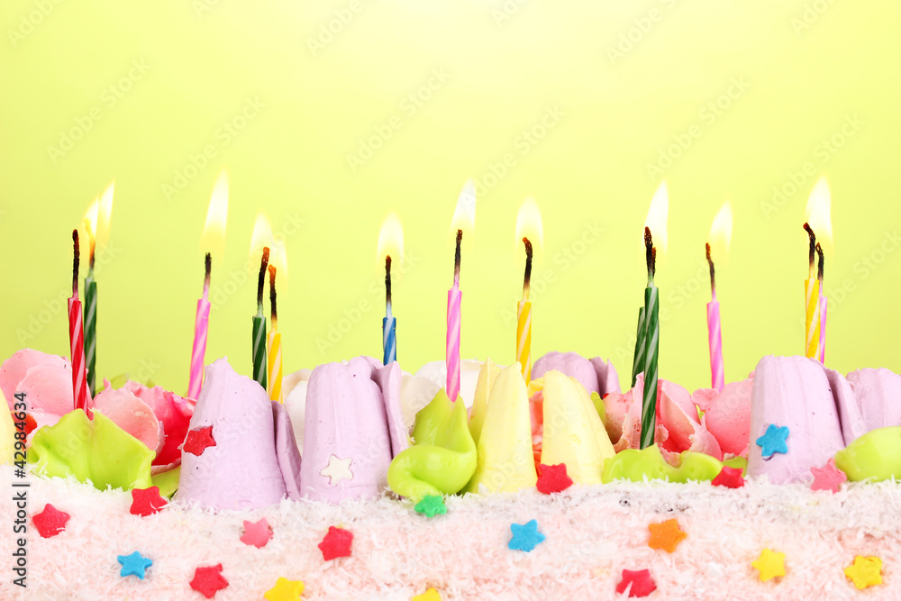 Birthday cake with candles on green background Birthday cake with candles on green background