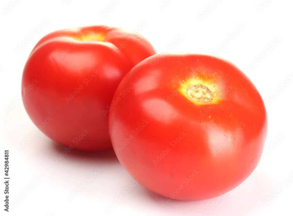 Ripe red tomatoes isolated on white Ripe red tomatoes isolated on white