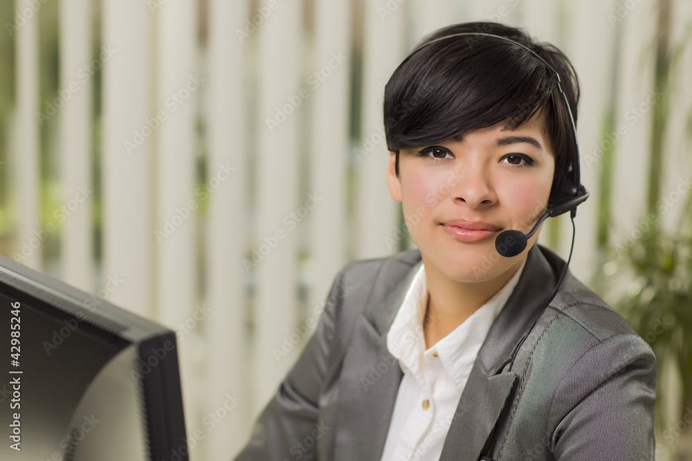Attractive Young Mixed Race Woman Smiles Wearing Headset Attractive Young Mixed Race Woman Smiles Wearing Headset