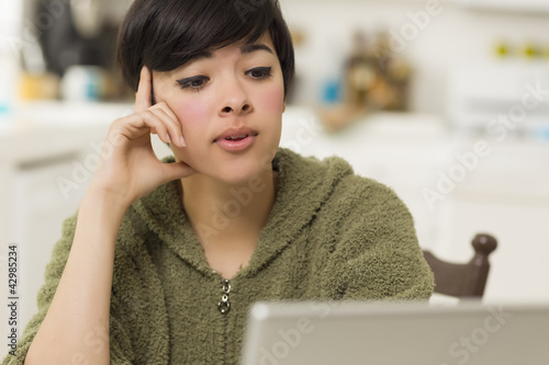 Pretty Mixed Race Woman Usi...