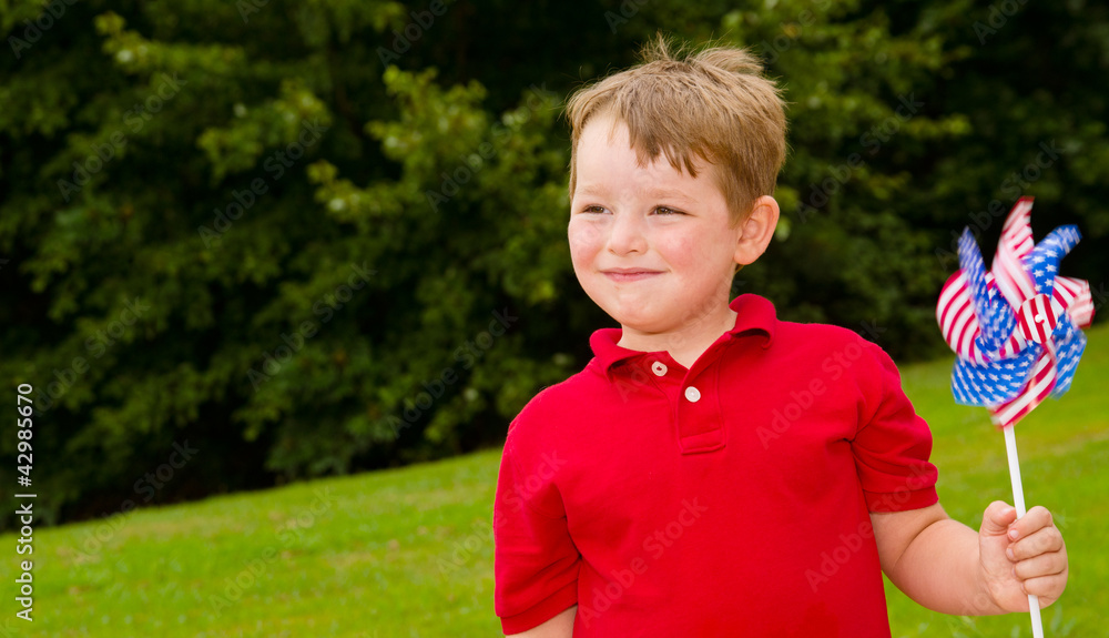 Child celebrating Independence Day on July Fourth Stock Photo | Adobe Stock