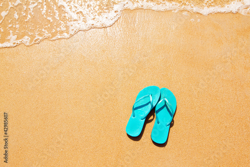 Flip flops on the sand
