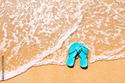 Flip flops on the sand
