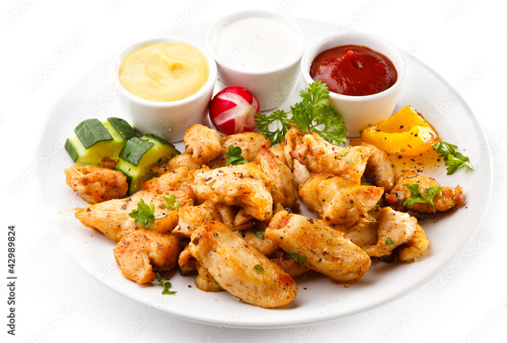 Grilled meat and vegetables on white background Grilled meat and vegetables on white background