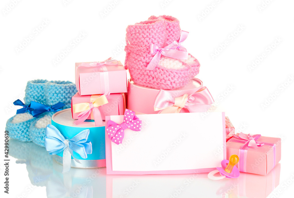 baby boots, pacifier, gifts and blank postcard isolated baby boots, pacifier, gifts and blank postcard isolated