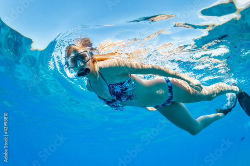 Woman Snorkeling in Tropical Ocean