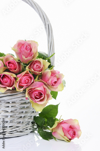 bouquet of pink roses in basket