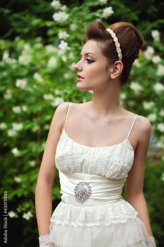very beautiful brunette in a wedding dress.