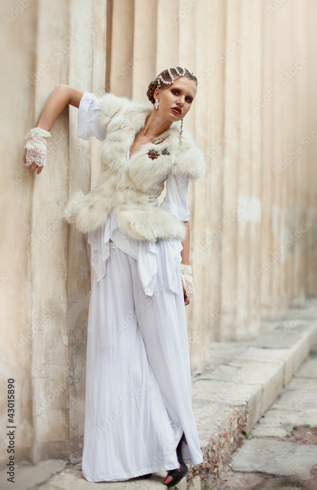 Fototapeta premium very beautiful brunette in a wedding dress.