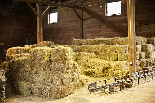 Interior of barn with hay bales