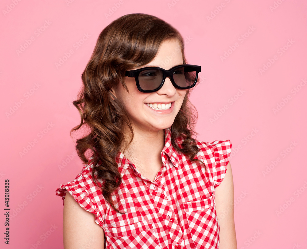 Smiling teenager wearing black goggles Smiling teenager wearing black goggles