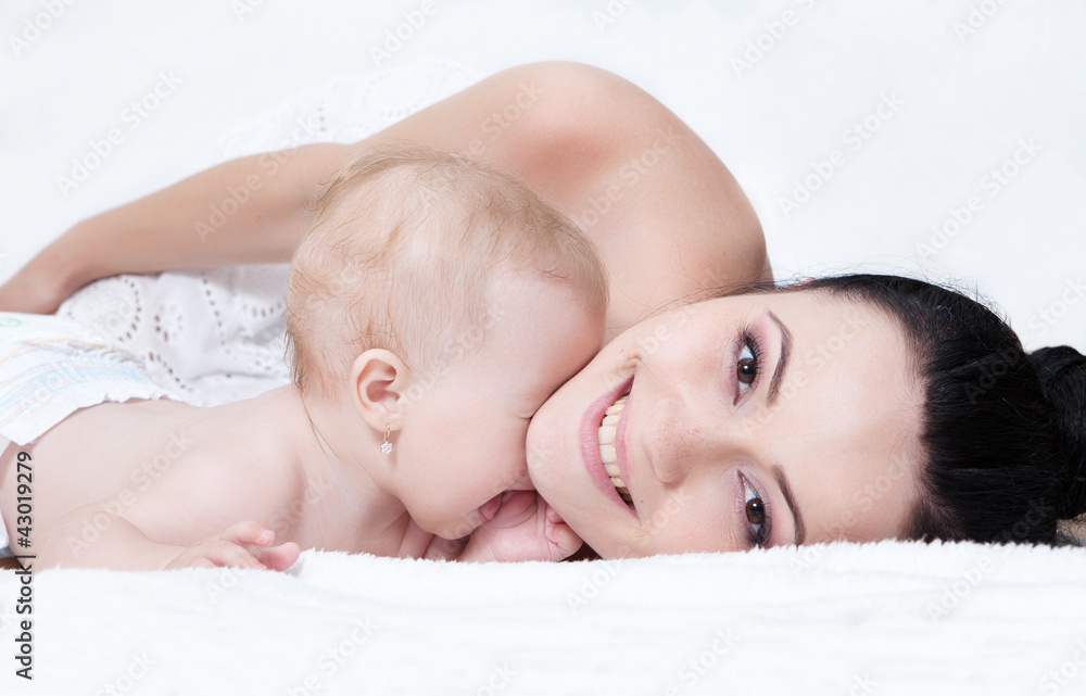happy mother with baby over white happy mother with baby over white