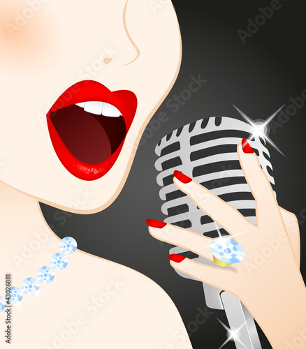 Close up of beautiful woman singing in microphone