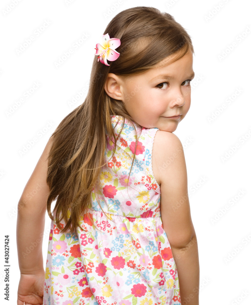 Little girl is looking back over her shoulder Little girl is looking back over her shoulder