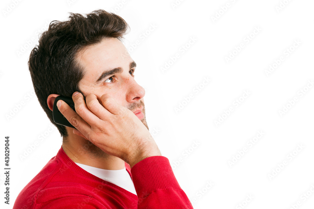 Happy man on the phone against a white background Happy man on the phone against a white background
