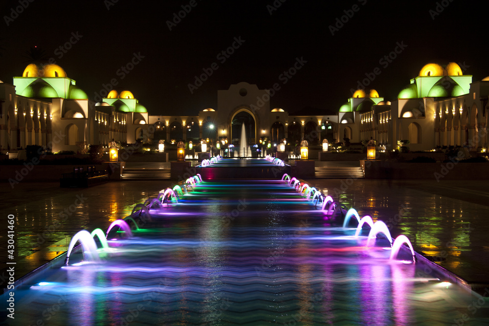 Dancing Multi Colored fountain at dark night