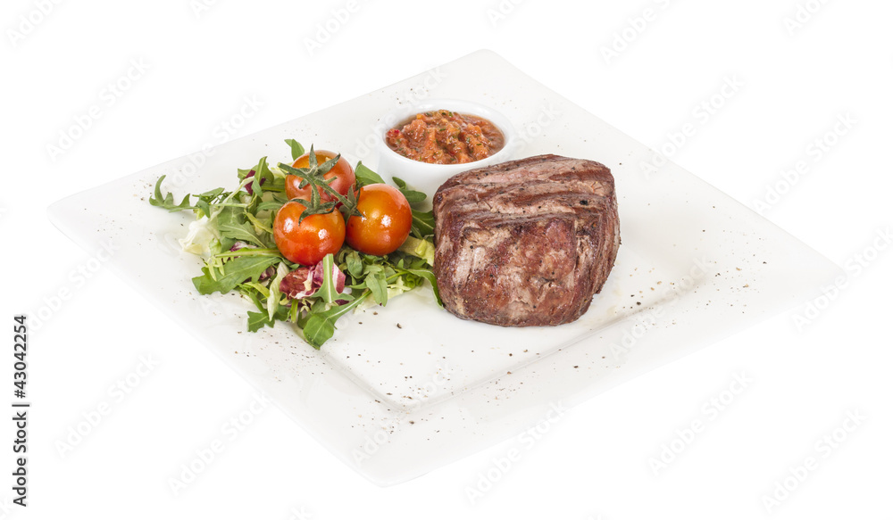 Grilled Beef Steak Isolated On a White Background Grilled Beef Steak Isolated On a White Background