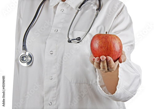 Apple in doctor's hand photo