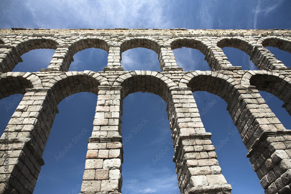 Blue sky, ancient watercourse in Segovia, Spain