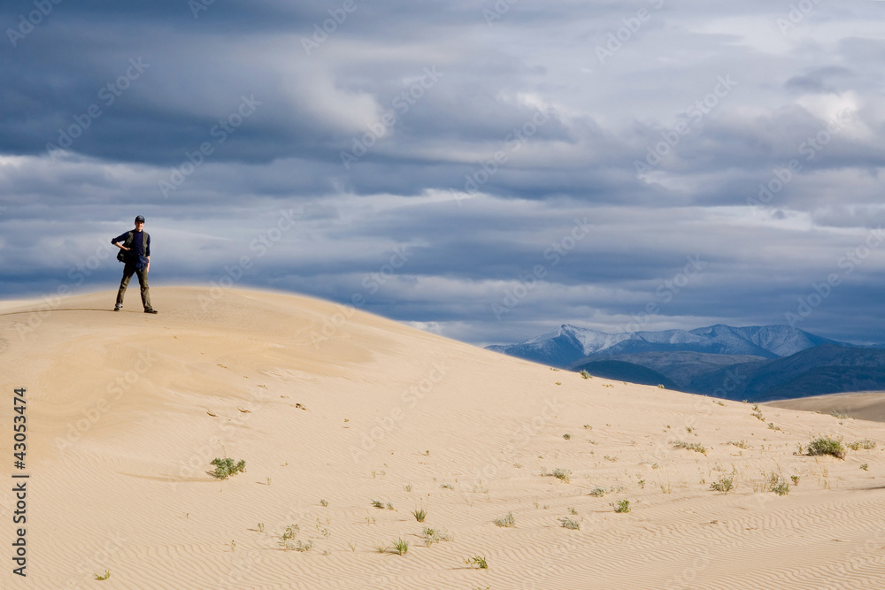 Desert landscape with traveler in Chara, Siberia