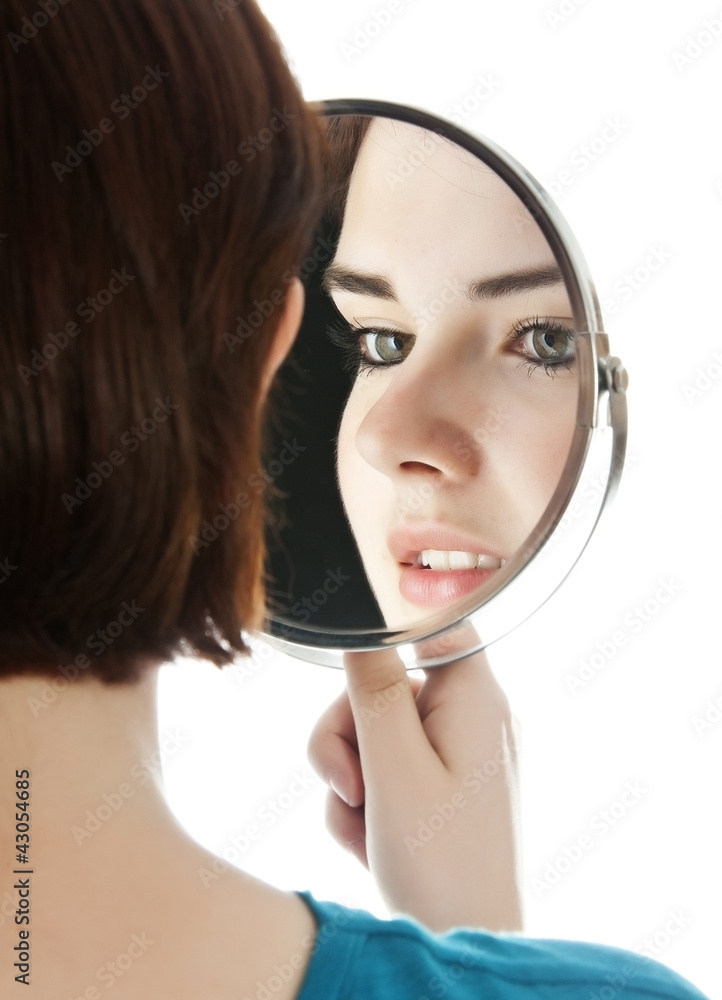 young woman holding a mirror Stock Photo Adobe Stock